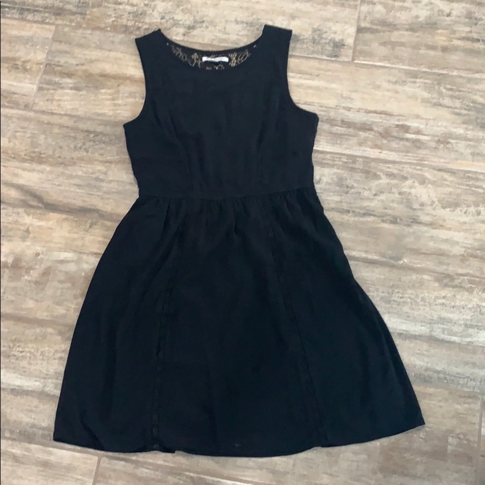 Black dress with lace cutouts